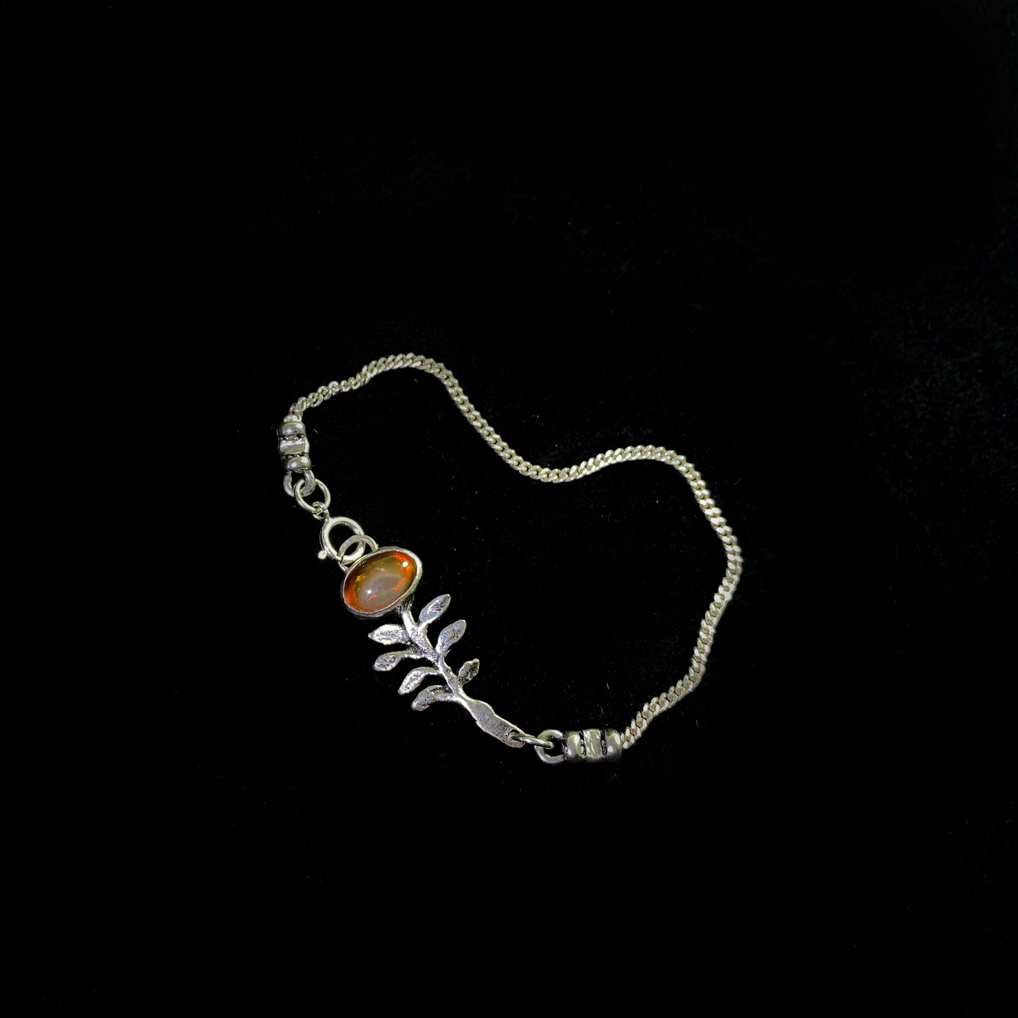 Silver Leaf Design Bracelet with Ember Gem
