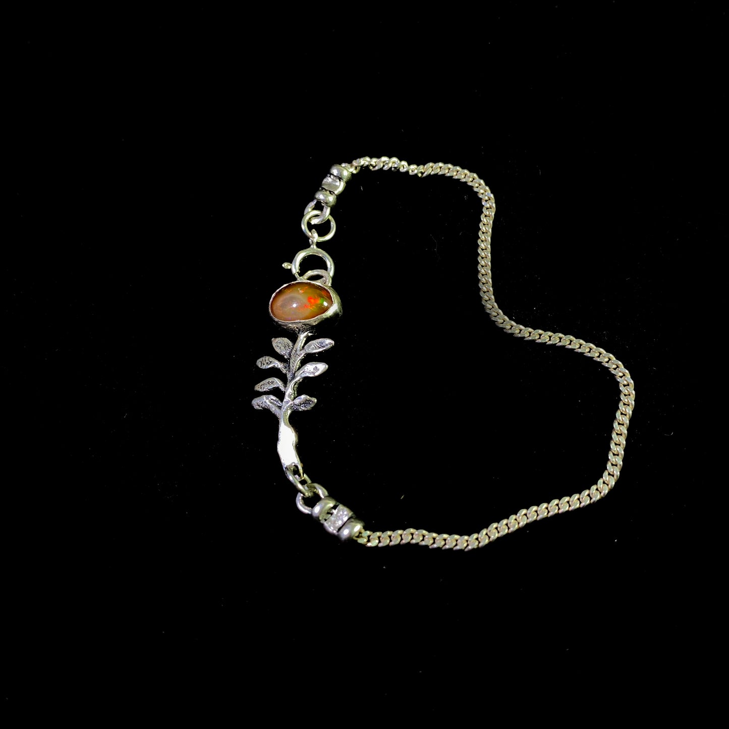 Silver Leaf Design Bracelet with Ember Gem